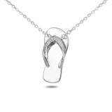 In this photo there is a sterling silver beach slipper pendant with topaz gemstones.