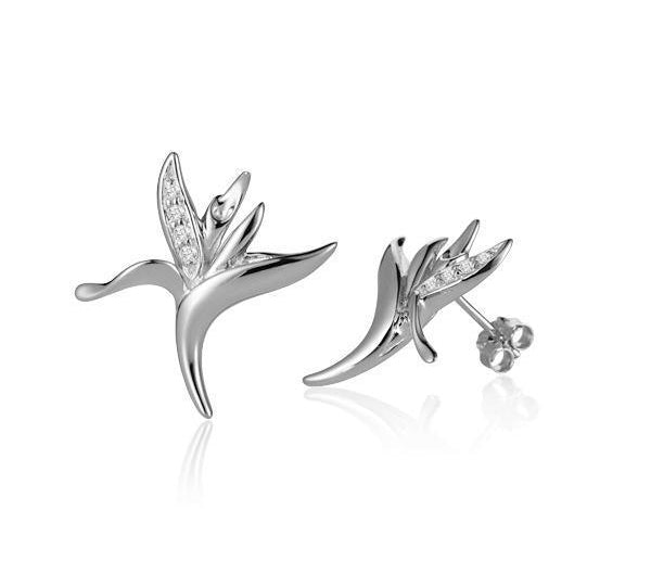 The picture shows a pair of 14K white gold bird of paradise stud earrings paired with diamonds.