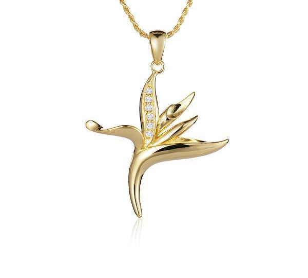 In this photo there is a small yellow gold bird of paradise pendant with diamonds.