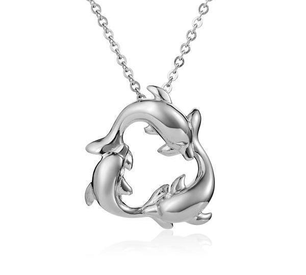 The picture shows a 925 sterling silver pendant featuring a circle of three dolphins with cubic zirconia.