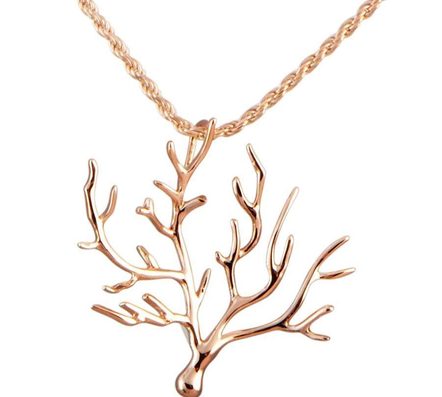 The picture shows a 14k rose gold coral pendant.