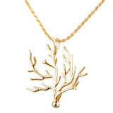 The picture shows a 14k yellow gold coral pendant.