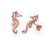 The picture shows a pair of 14K rose gold seahorse stud earrings with diamonds.