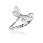 In this photo there is a 925 sterling silver dragonfly ring with topaz gemstones.