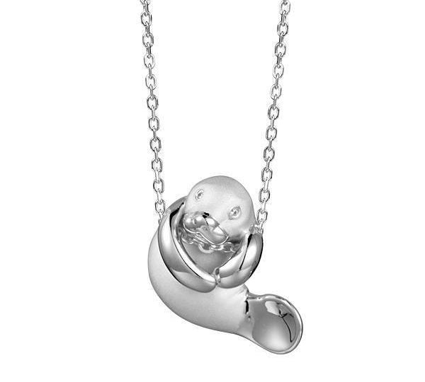 The picture shows a 925 sterling silver manatee pendant.