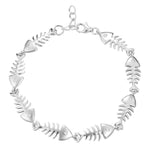 The picture shows a 925 sterling silver fish bone bracelet with topaz.