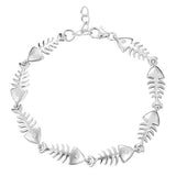 The picture shows a 925 sterling silver fish bone bracelet with topaz.