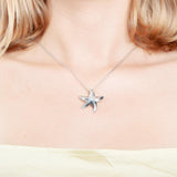 The picture shows a 925 sterling silver white gold vermeil starfish pendant with cubic zirconia.