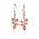 In this photo there is a pair of 14k rose gold heliconia flower hook earrings.
