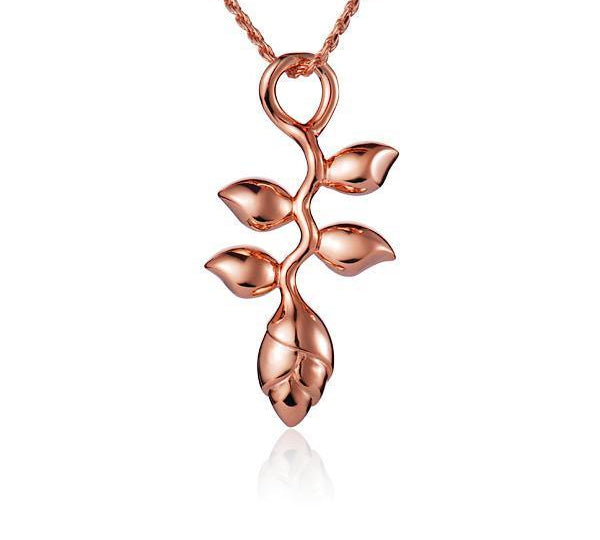 In this photo there is a rose gold heliconia flower pendant.