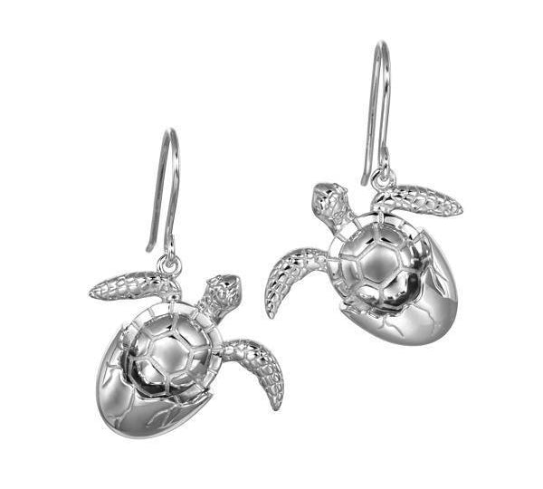 The picture shows a pair of 925 sterling silver sea turtle hatchling hook earrings.