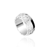 The picture shows a 925 sterling silver 8mm ring with hand engravings including sea turtles.