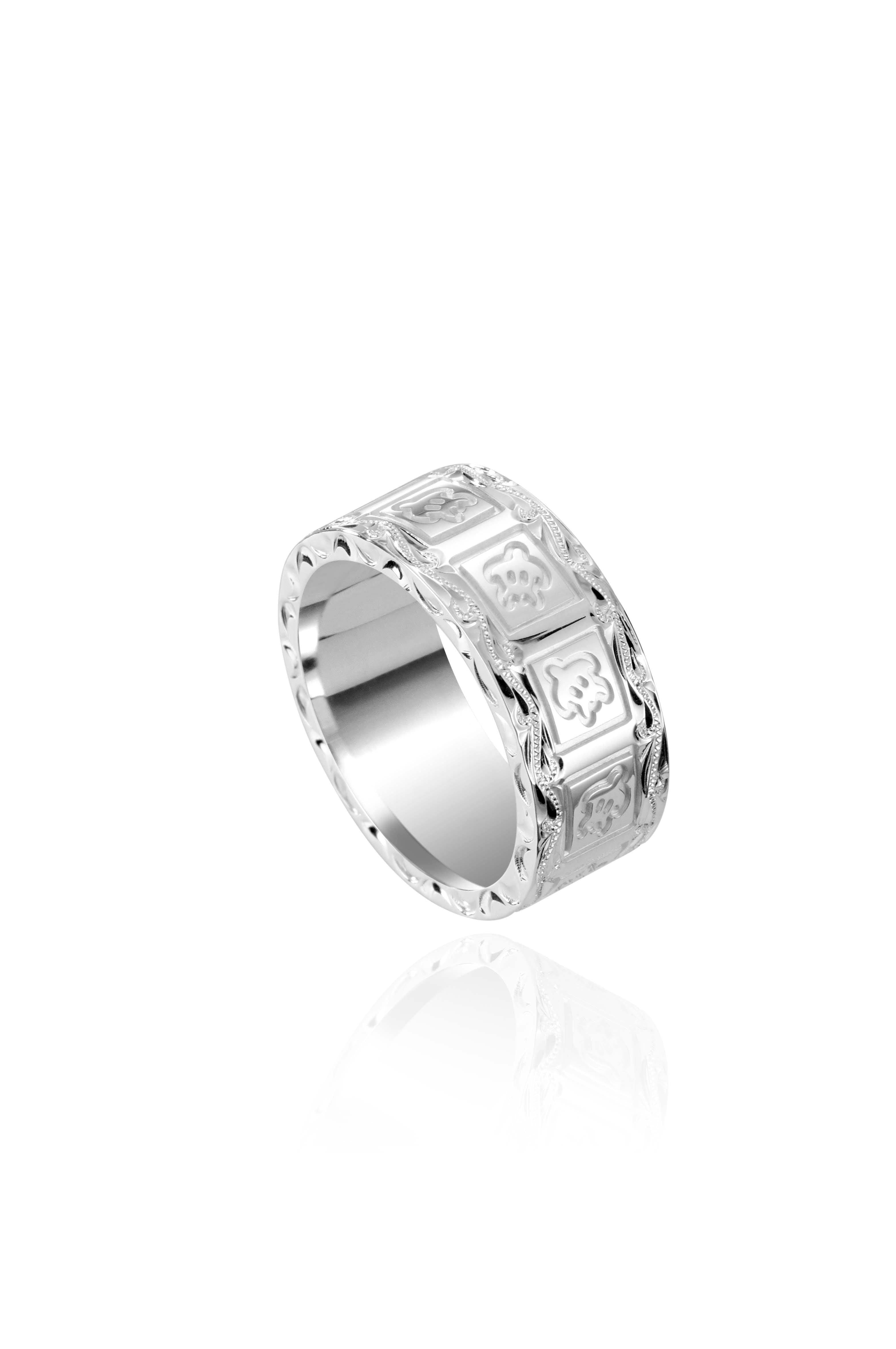 The picture shows a 925 sterling silver 8mm ring with hand engravings including sea turtles