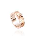 The picture shows a 14K rose gold sea turtle 6 mm Naupaka ring.