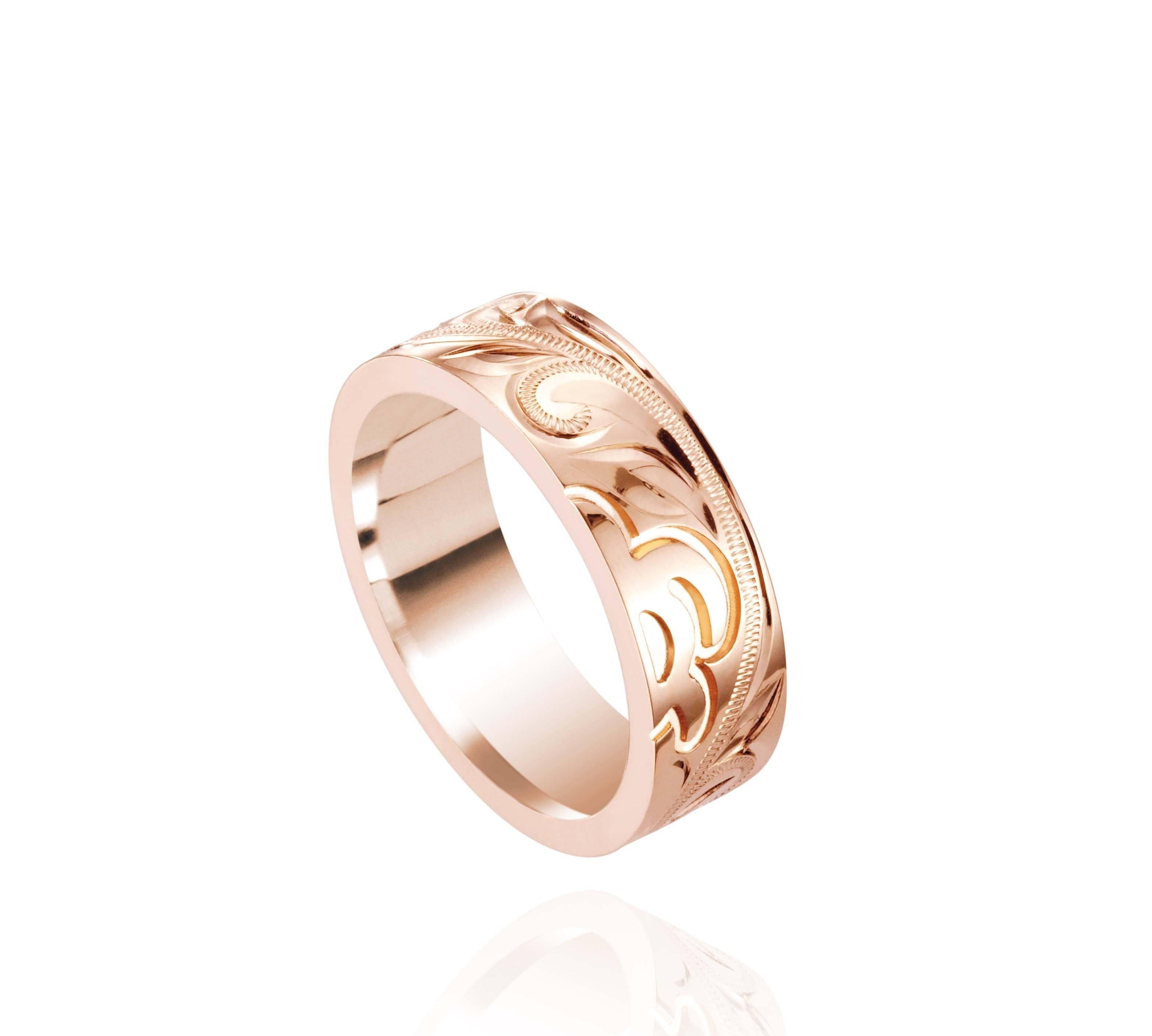 The picture shows a 14K rose gold sea turtle 6 mm Naupaka ring.