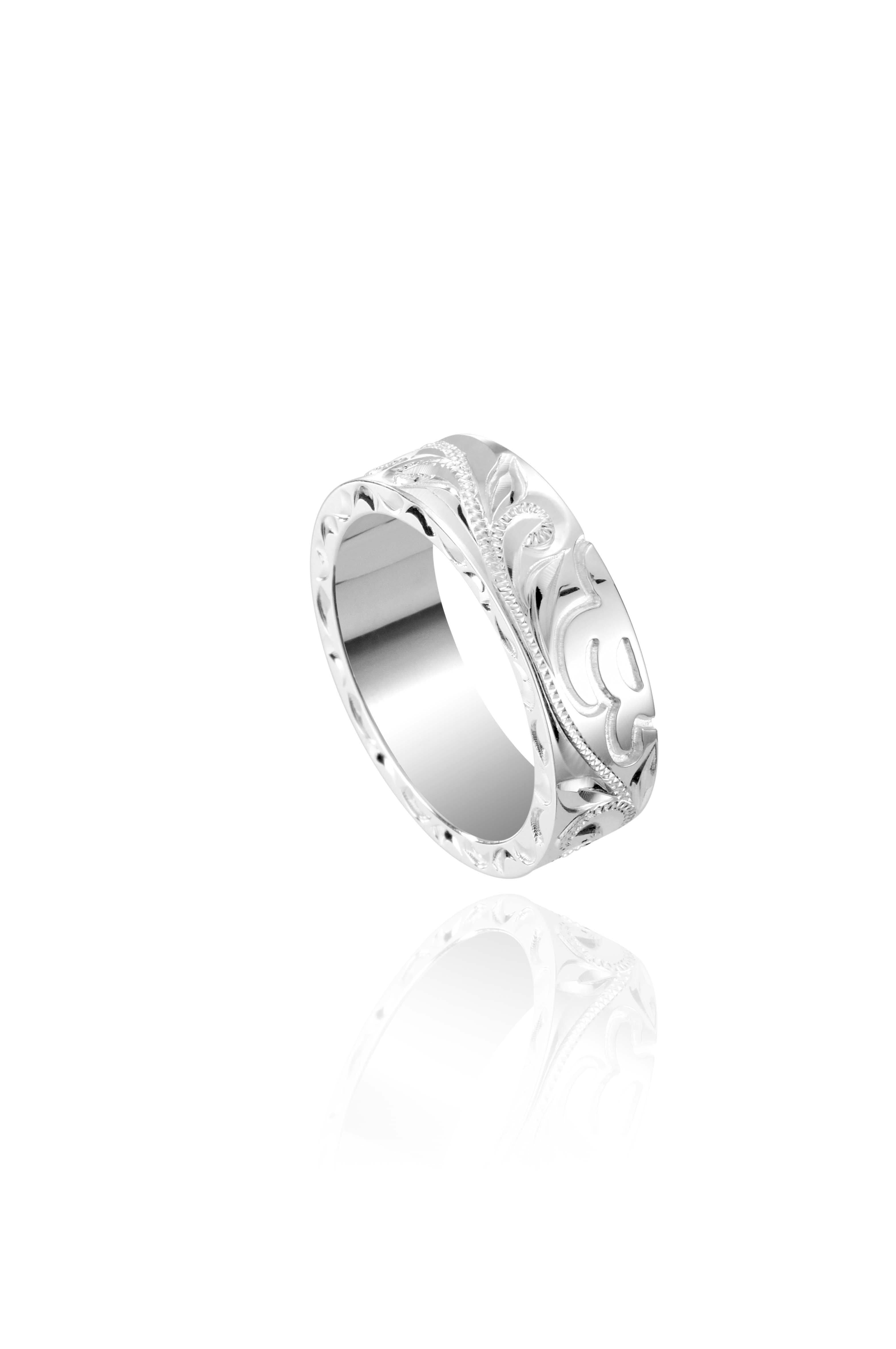 The picture shows a 925 sterling silver matching sea turtle 6mm ring with hand engravings.