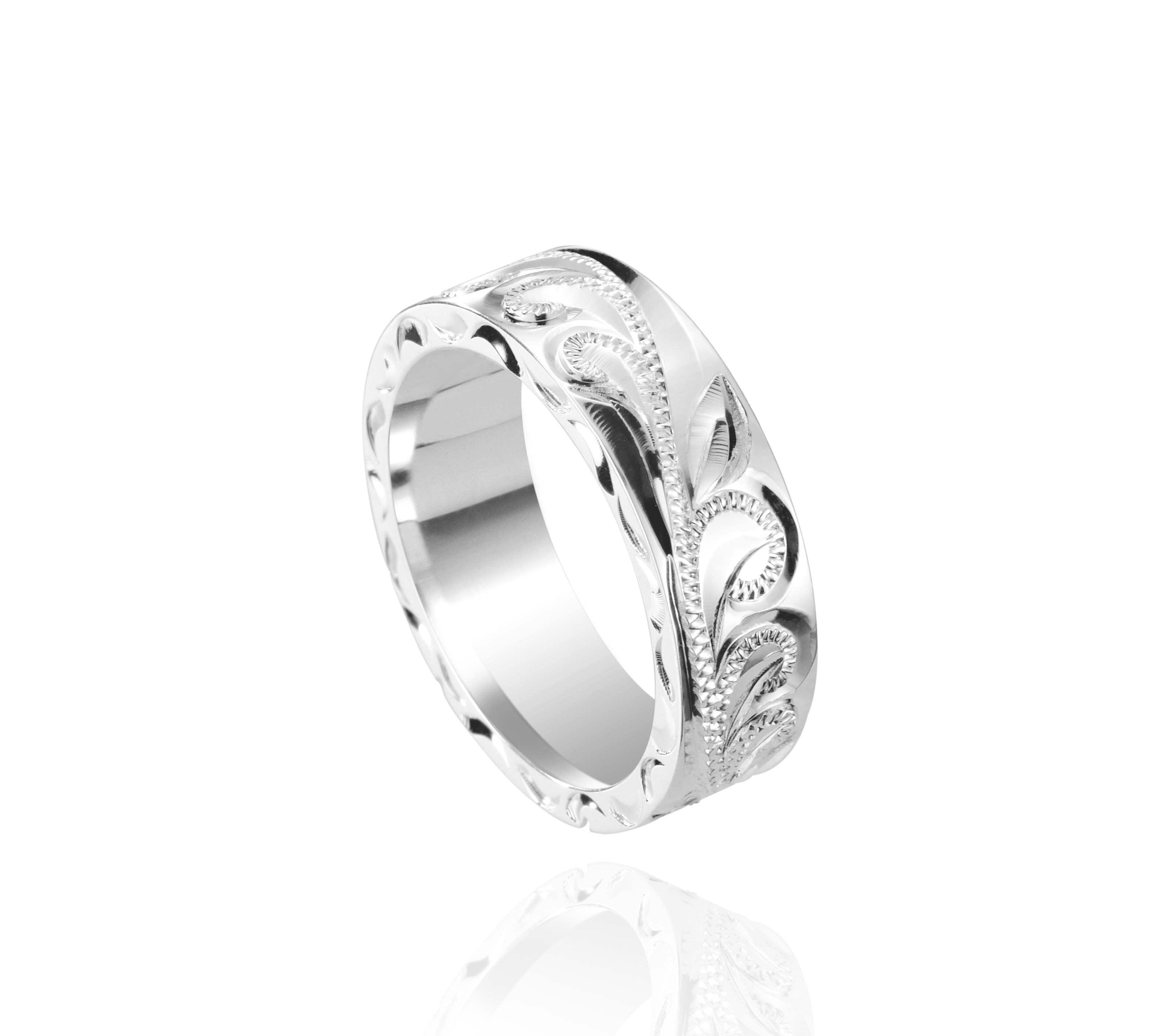 The picture shows a 925 sterling silver matching sea turtle 6mm ring with hand engravings.