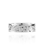 The picture shows a 925 sterling silver matching sea turtle 6mm ring with hand engravings.