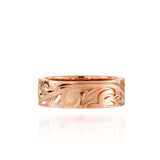 The picture shows a 14K rose gold sea turtle 6 mm Naupaka ring.