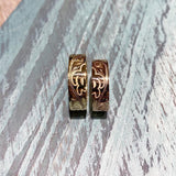 The picture shows a 14K yellow and rose gold sea turtle ring with half a sea turtle engraving.