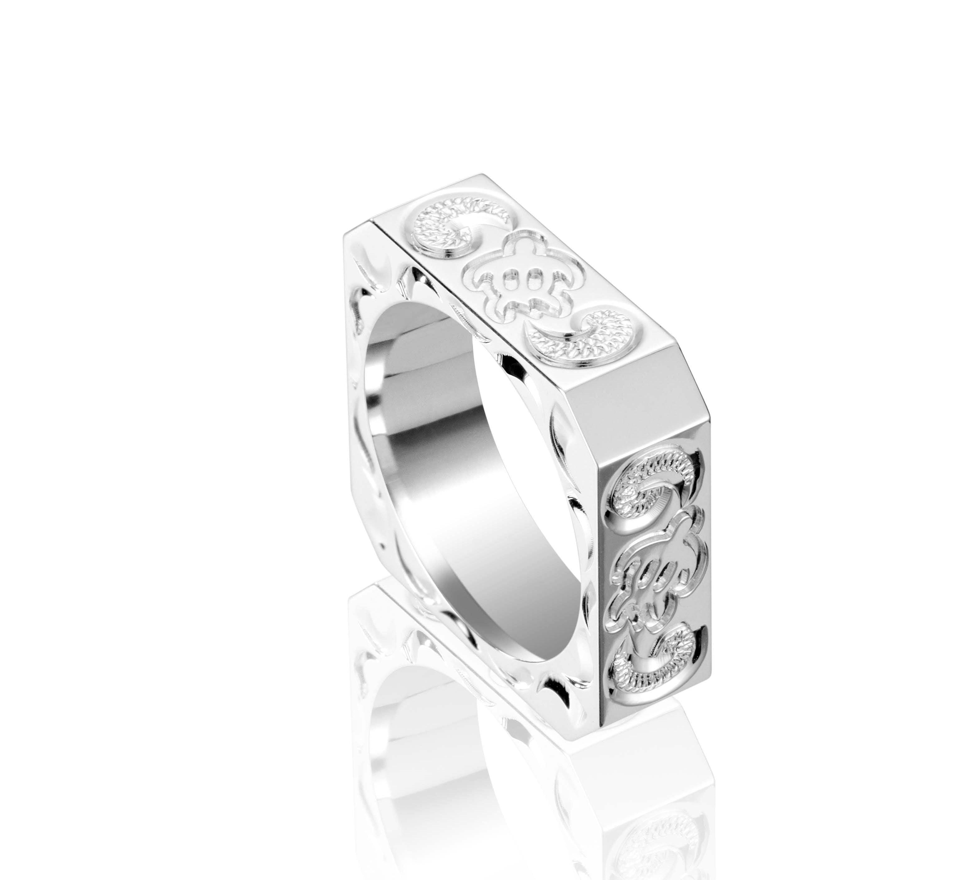 The picture shows a 925 sterling silver squared 8mm ring with hand engravings including a sea turtle.