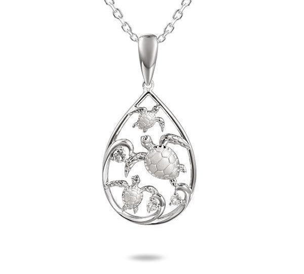The picture shows a 925 sterling silver teardrop design with three sea turtles pendant with topaz.