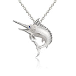 The picture shows a 925 sterling silver marlin pendant with cubic topaz and sapphire.