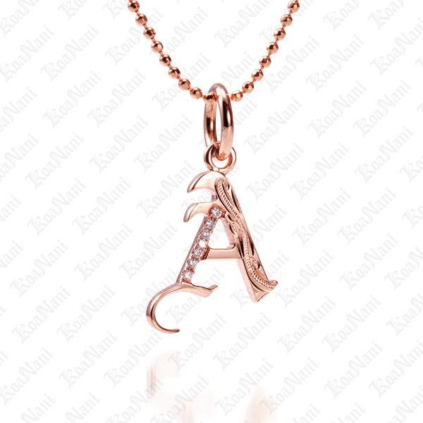 The picture shows a 14K rose gold Koa Nani A initial pendant.