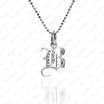 The picture shows a 14K white gold Koa Nani B initial pendant.