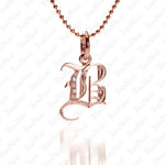 The picture shows a 14K rose gold Koa Nani B initial pendant.