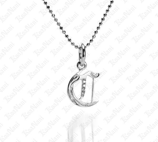 The picture shows a 14K white gold Koa Nani C initial pendant.