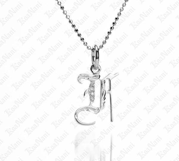 The picture shows a 14K white gold Koa Nani F initial pendant.