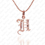 The picture shows a 14K rose gold Koa Nani H initial pendant.