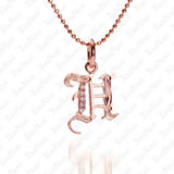 The picture shows a 14K rose gold Koa Nani H initial pendant.