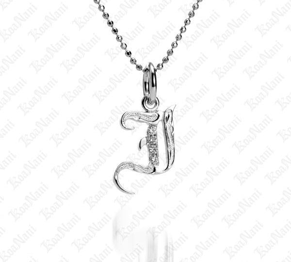 The picture shows a 14K white gold Koa Nani I initial pendant.