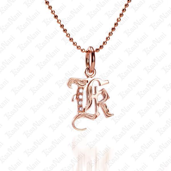 The picture shows a 14K rose gold Koa Nani K initial pendant.