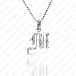 The picture shows a 14K white gold Koa Nani M initial pendant.