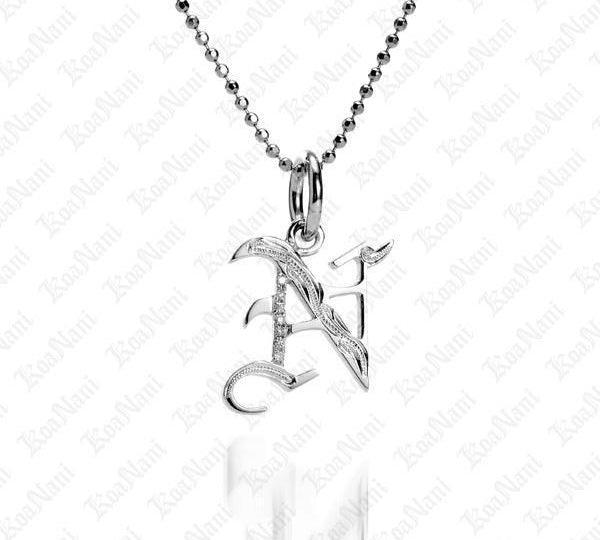 The picture shows a 14K white gold Koa Nani N initial pendant.