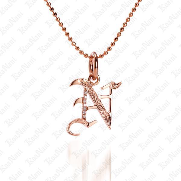The picture shows a 14K rose gold Koa Nani N initial pendant.