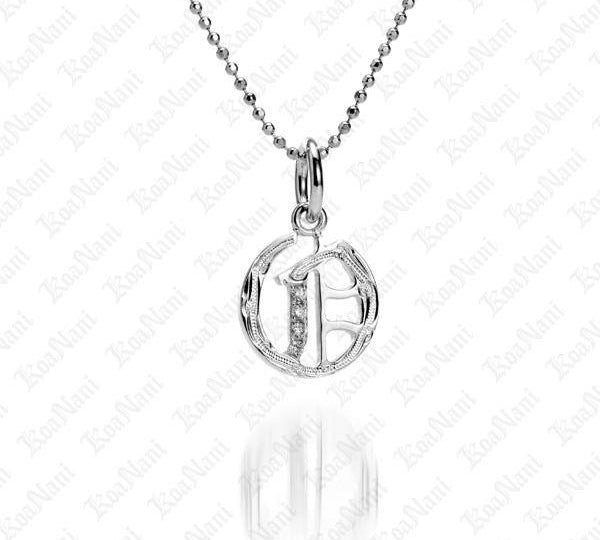 The picture shows a 14K white gold Koa Nani O initial pendant.