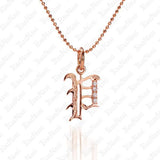 The picture shows a 14K rose gold Koa Nani P initial pendant.