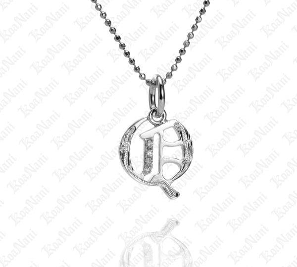 The picture shows a 14K white gold Koa Nani Q initial pendant.