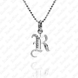 The picture shows a 14K white gold Koa Nani R initial pendant.