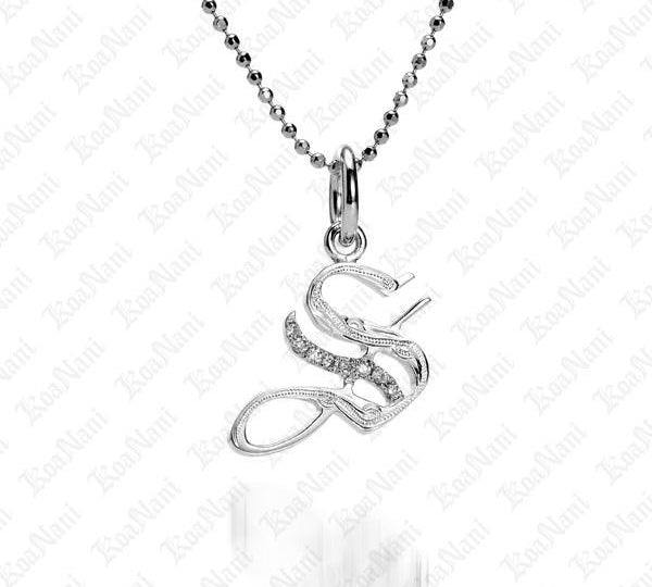 The picture shows a 14K white gold Koa Nani S initial pendant.