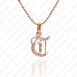 The picture shows a 14K rose gold Koa Nani T initial pendant.