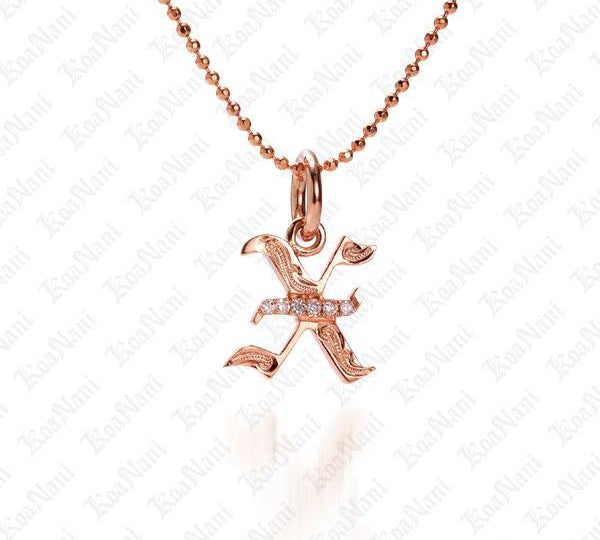 The picture shows a 14K rose gold Koa Nani X initial pendant.