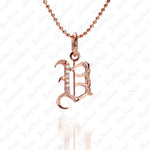 The picture shows a 14K rose gold Koa Nani V initial pendant.
