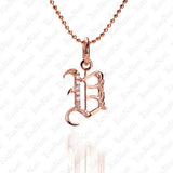 The picture shows a 14K rose gold Koa Nani V initial pendant.