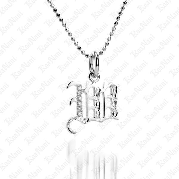 The picture shows a 14K white gold Koa Nani W initial pendant.