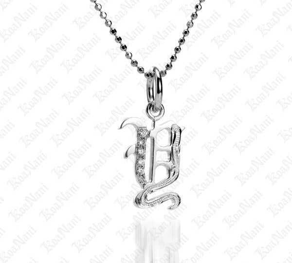 The picture shows a 14K white gold Koa Nani Y initial pendant.
